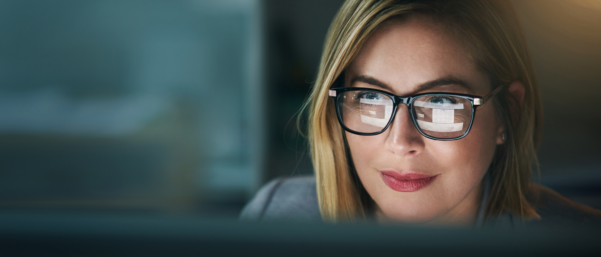 Woman working at computer in office