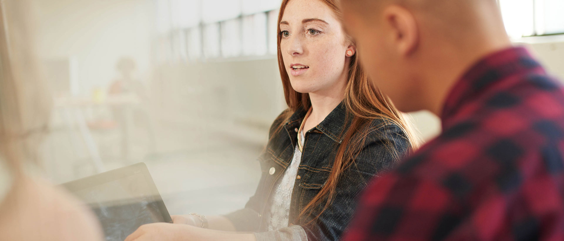 Image of woman in denim jacket